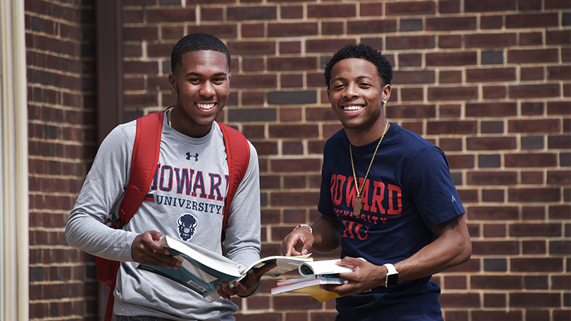 Students on reading a textbook